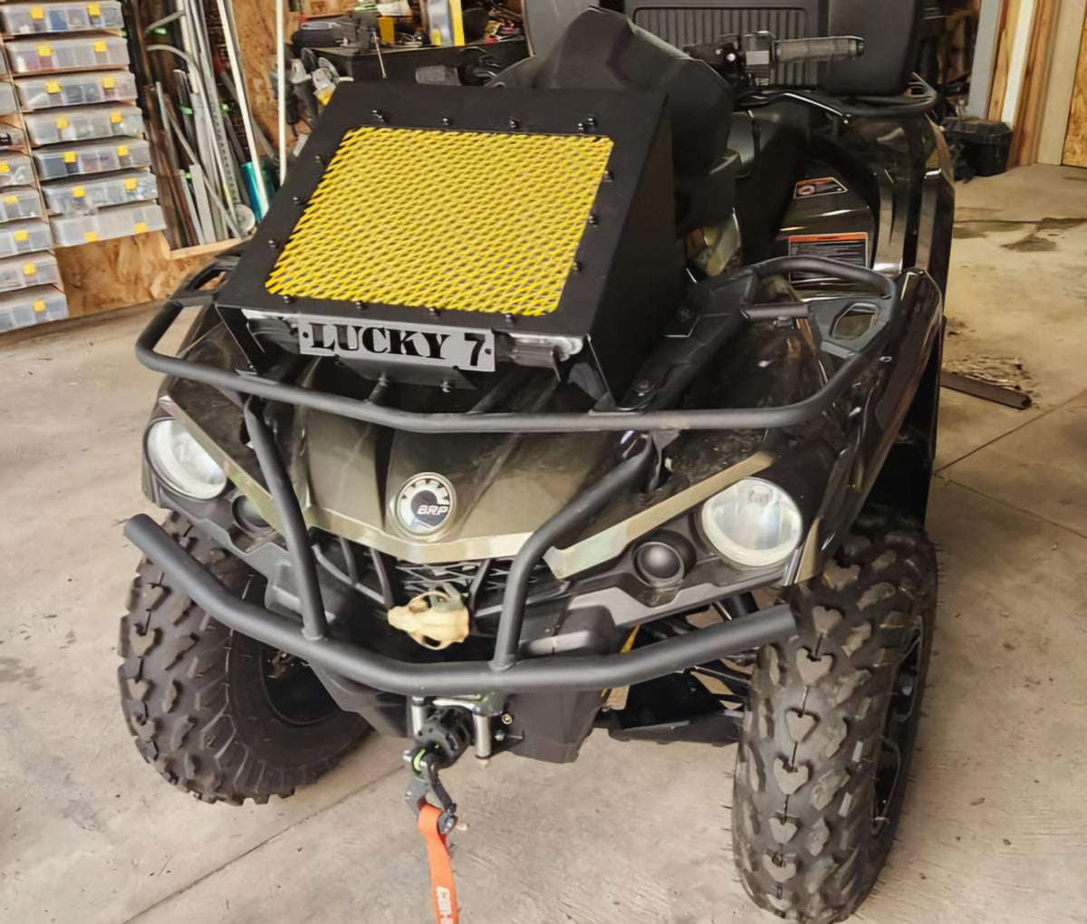 Lucky 7 2012-2024 Can-Am Outlander mesh radiator relocation kit Lucky 7 plate Neo Yellow installed on the machine