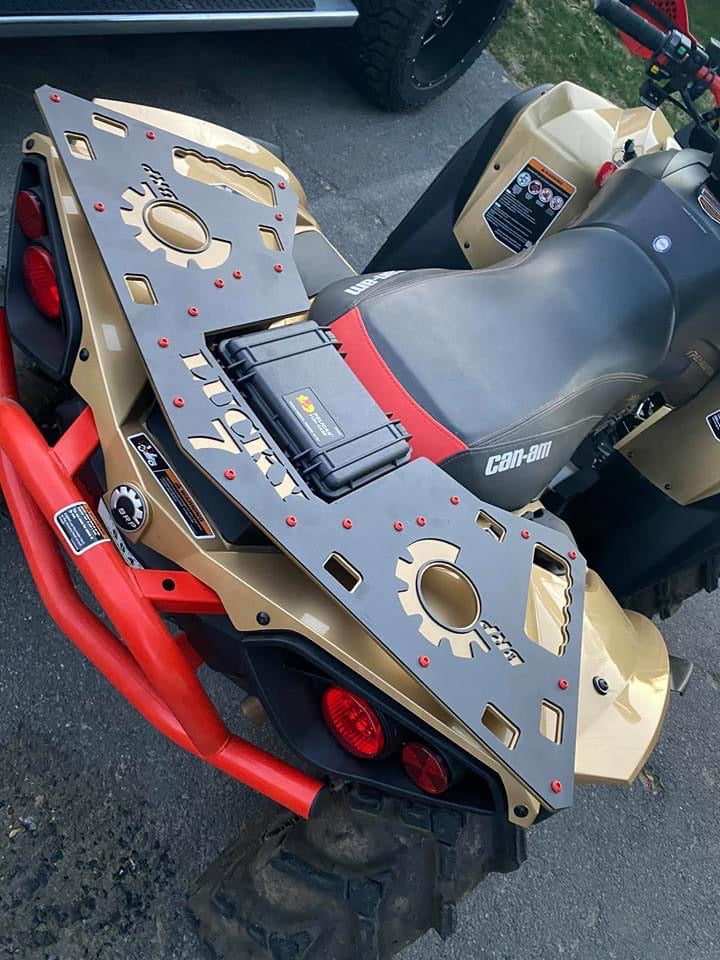 Lucky 7 gold rear rack with storage case on a Can-Am Renegade