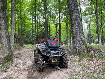 Lucky 7 2013-2024 Can-Am Outlander XMR Punisher BRP radiator relocate cover Orange installed on the trail