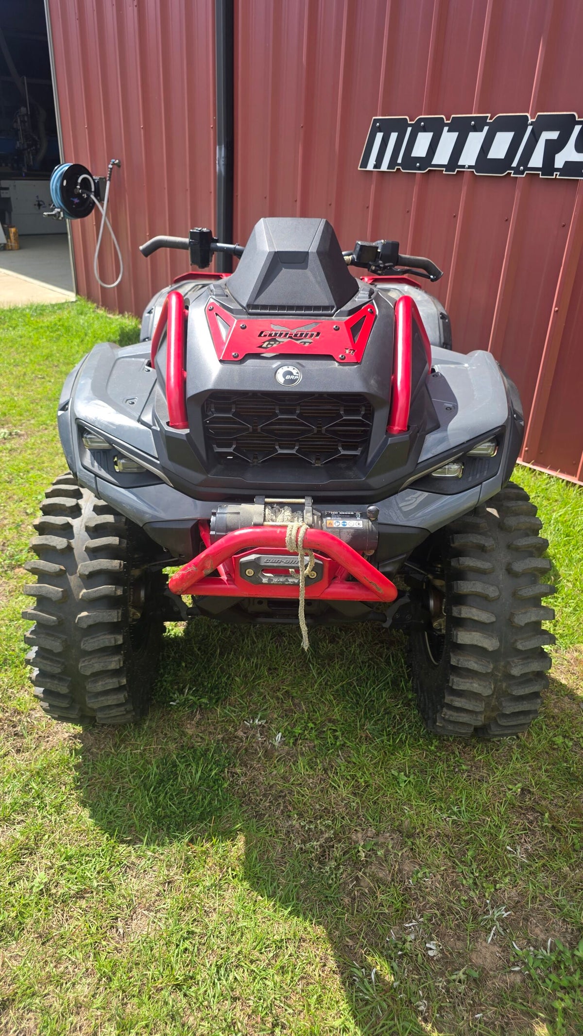 Lucky 7 2025 Can-Am Outlander XMR Gen 3 radiator cover Can Am X Legion Red front view on the machine