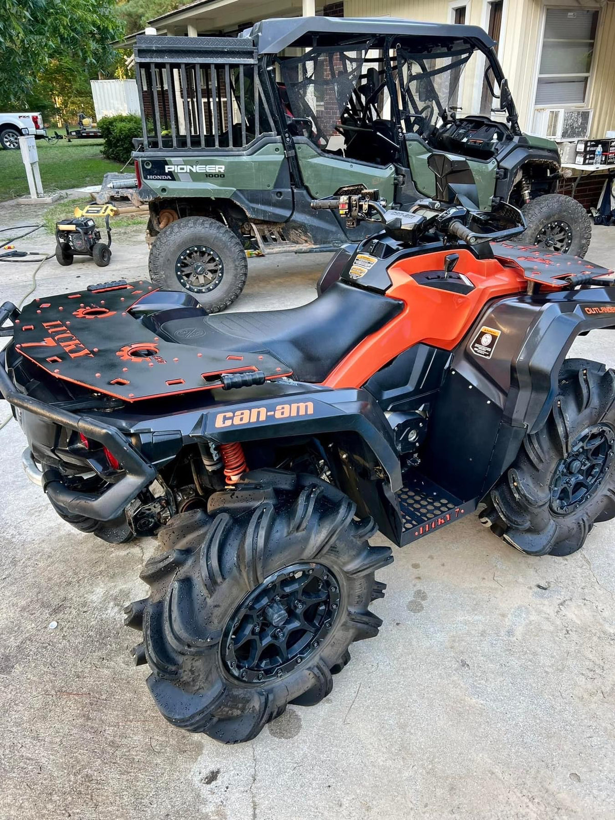 Lucky 7 Outlander G2 rear rack on an orange Can-Am