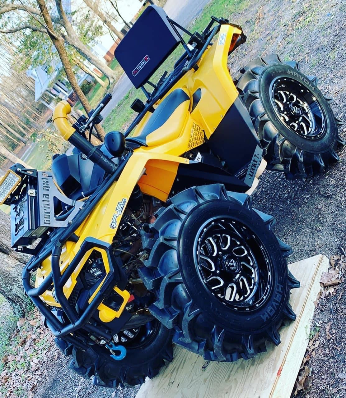 Yellow Can-Am Outlander Gen 1 short frame with Lucky 7 metal floorboards