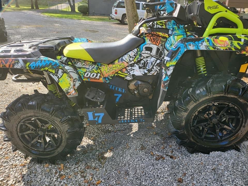 Custom-wrapped Can-Am Outlander Gen 2 Max with Lucky 7 metal floorboards