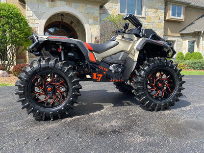 Tan and orange Can-Am Outlander Gen 2 Max with Lucky 7 metal floorboards