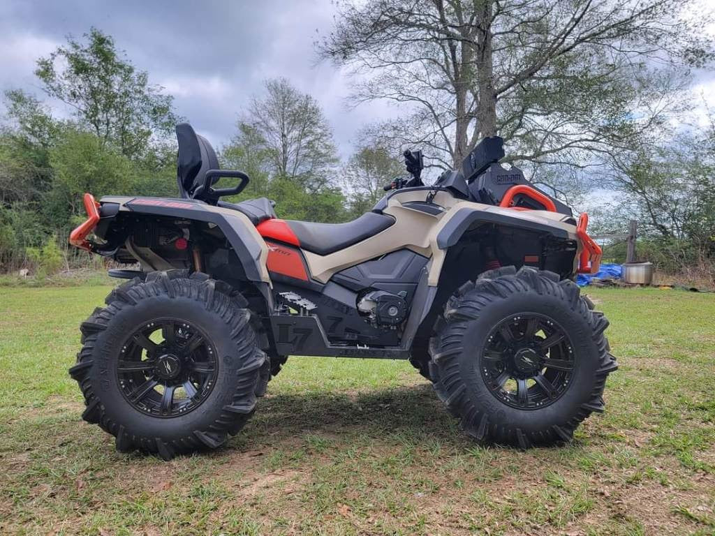 Tan and red Can-Am Outlander Gen 2 Max with Lucky 7 metal floorboards