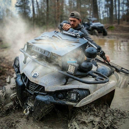 Lucky 7 radiator relocate kit on a Can-Am Outlander Gen 2 in the mud