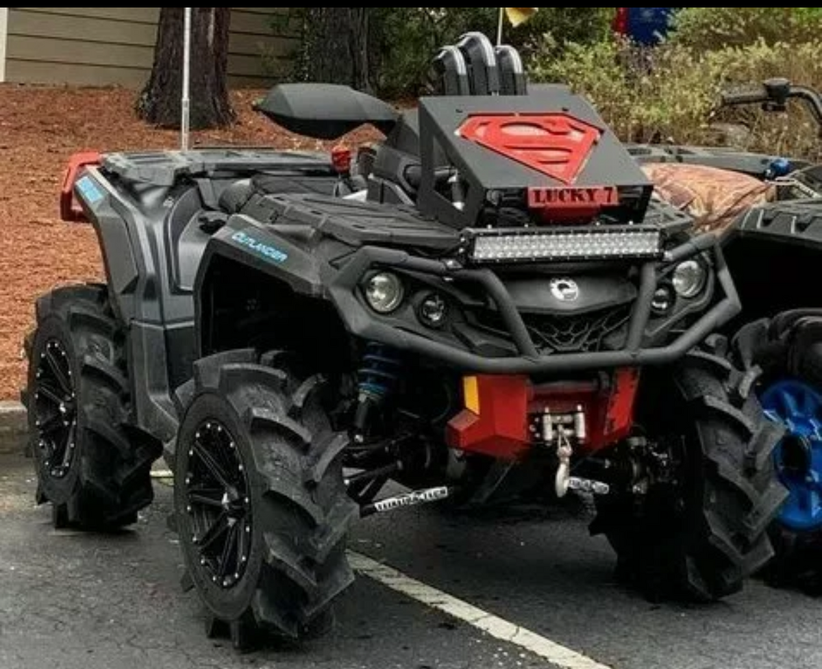 Superman design Lucky 7 radiator relocate kit on a Can-Am Outlander Gen 2