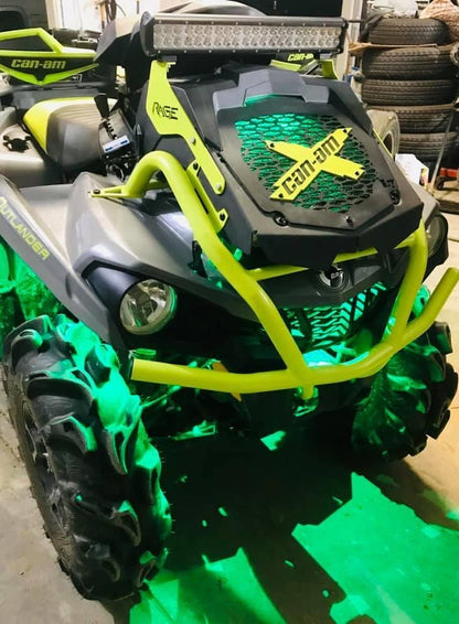 Close-up of a manta green Can-Am X Lucky 7 radiator relocate cover on an Outlander MAX XMR