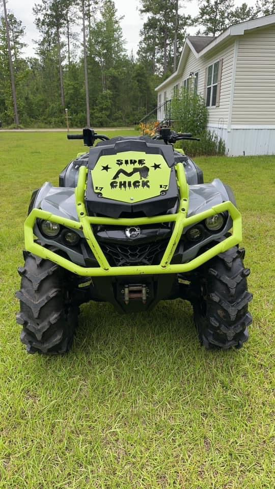 Front view of a custom Lucky 7 radiator relocate cover on a Can-Am Outlander MAX XMR