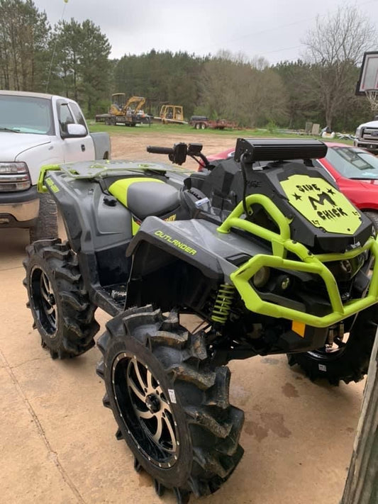 Custom Lucky 7 radiator relocate cover installed on a Can-Am Outlander MAX XMR