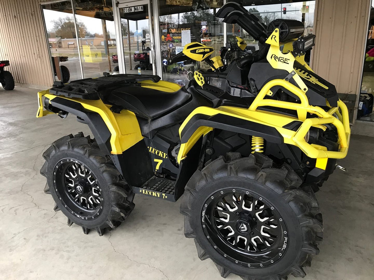 Yellow Can-Am Outlander with Lucky 7 metal floorboards