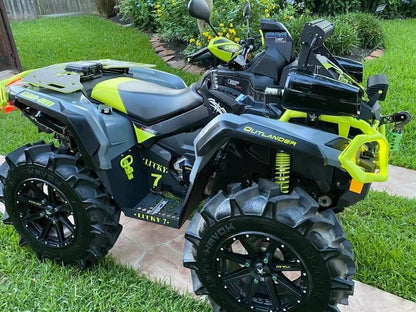 Yellow Can-Am Outlander with Lucky 7 metal floorboards