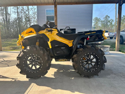 Yellow Can-Am Outlander with Lucky 7 metal floorboards