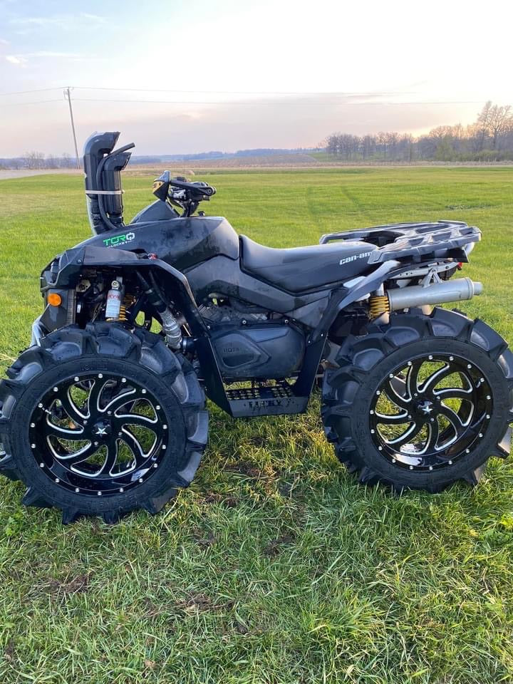 Black Can-Am Renegade Gen 1 with Lucky 7 metal floorboards