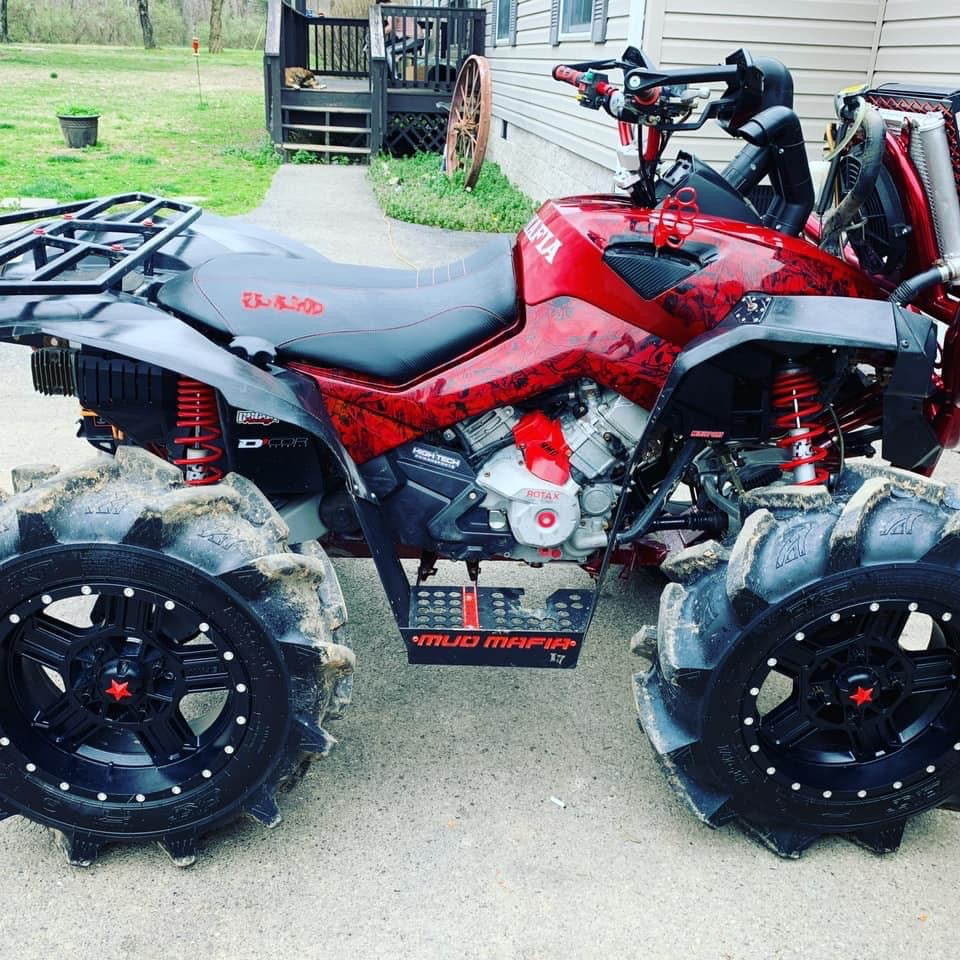 Red Can-Am Renegade Gen 1 with Lucky 7 metal floorboards