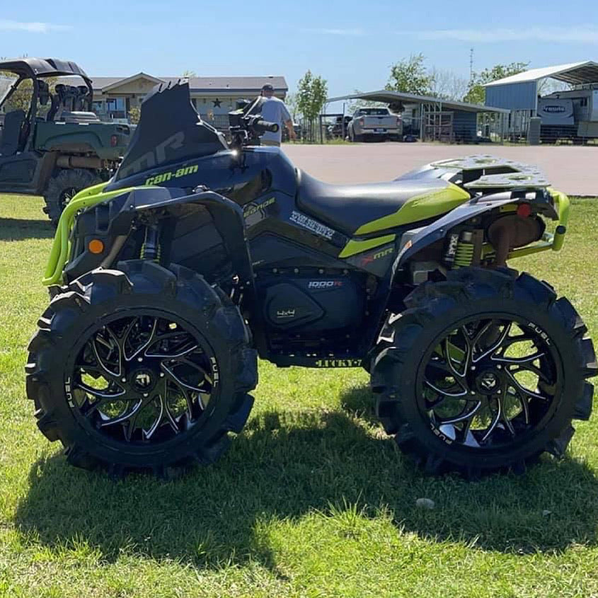 Blue and yellow Can-Am Renegade Gen 2 with Lucky 7 metal floorboards
