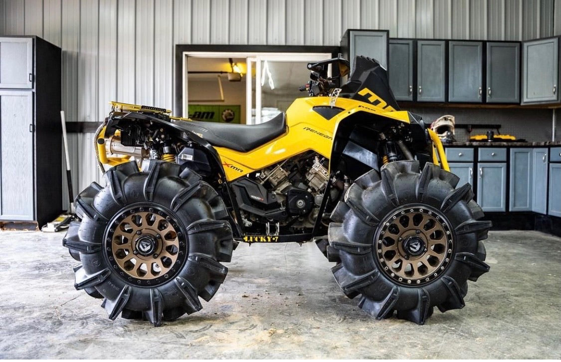 Yellow Can-Am Renegade Gen 2 with Lucky 7 metal floorboards
