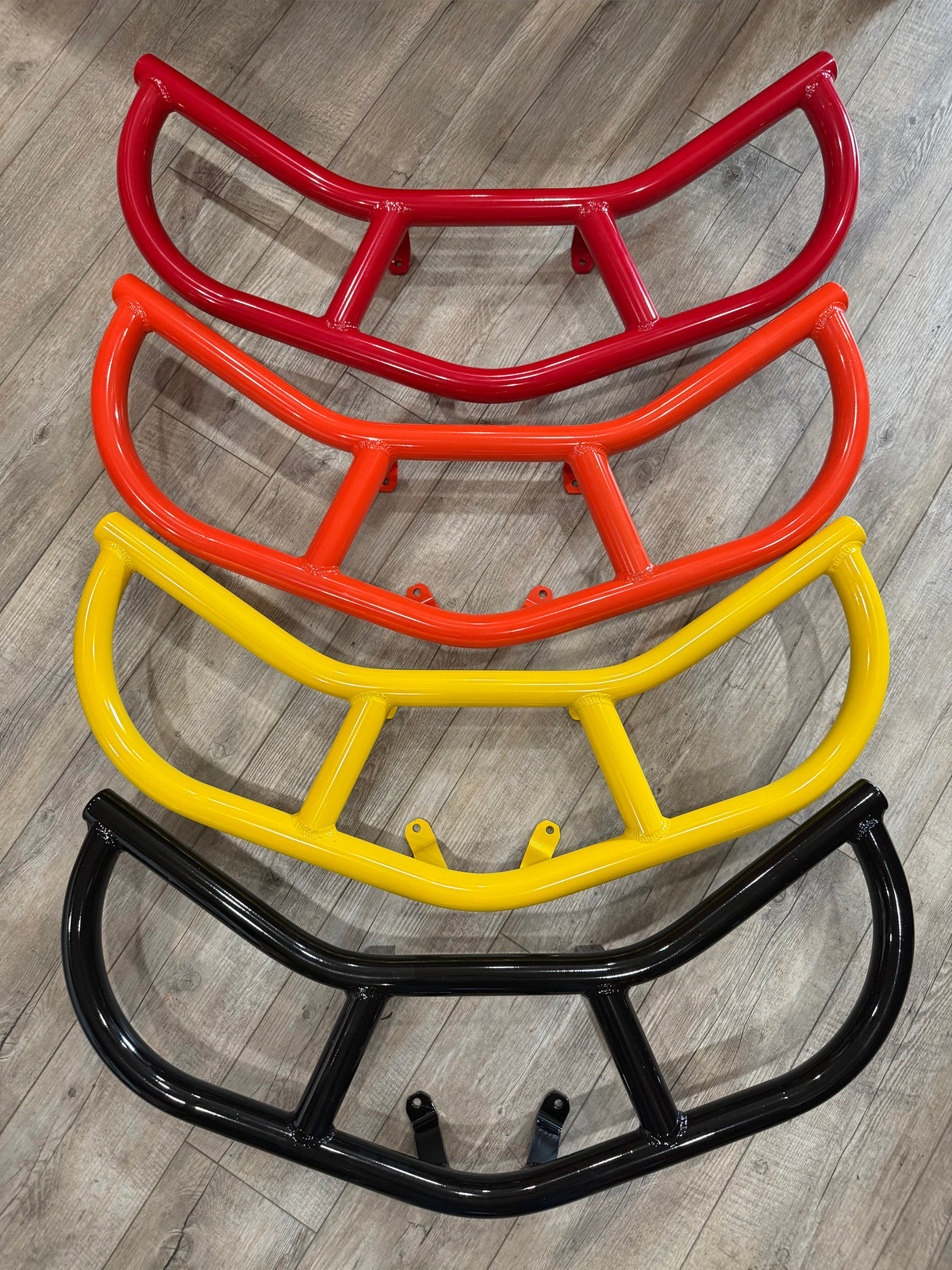 Lucky 7 Can-Am Renegade aluminum tube racks in red, orange, yellow, and black