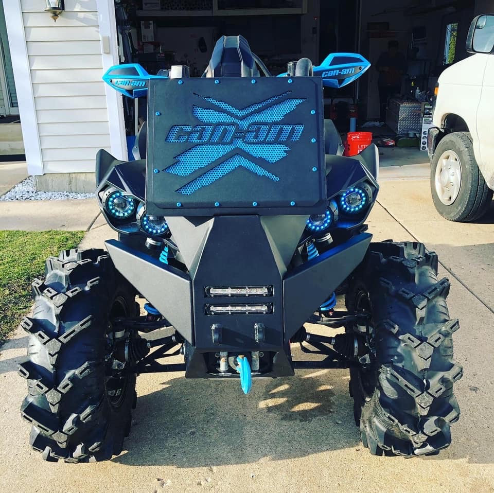 Blue Can-Am X Lucky 7 radiator relocate bumper on a Can-Am Renegade XMR