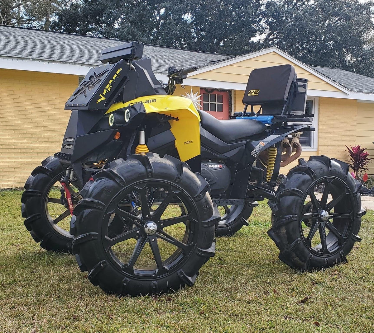 Lucky 7 radiator relocate bumper on a yellow Can-Am Renegade XMR