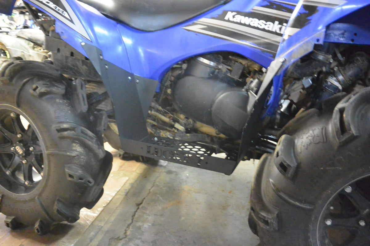 Front angle of Lucky 7 high clearance floorboards on a Brute Force 750