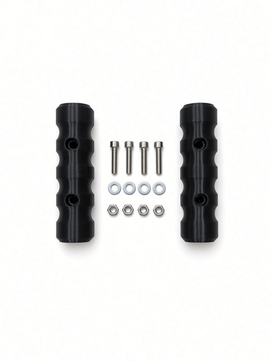 Pair of black Lucky 7 rear rack handgrips with bolts, washers, and nuts on a white background