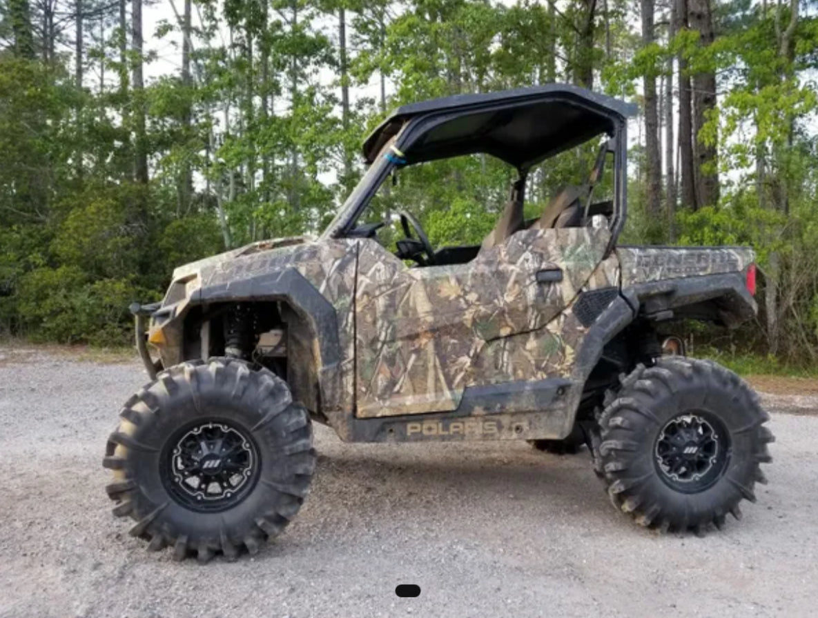 Camo Polaris General 1000 with a Lucky 7 4 inch lift kit