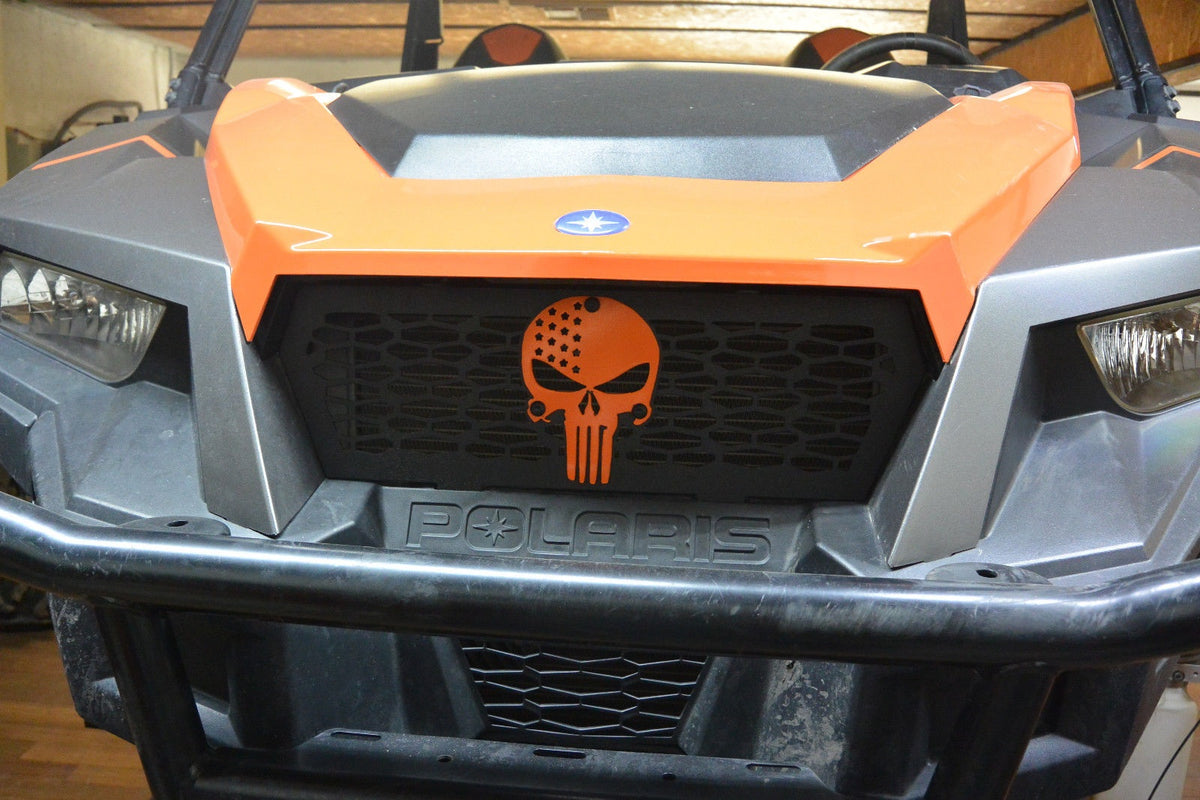 Orange Punisher Lucky 7 grille on a Polaris General 1000