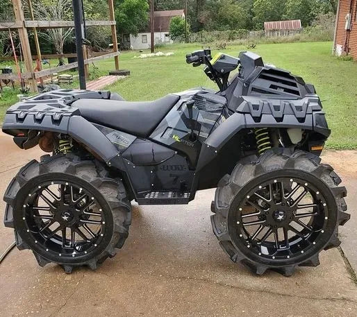 Polaris Sportsman with 2 inch lift kit installed by Lucky 7 Motorsports