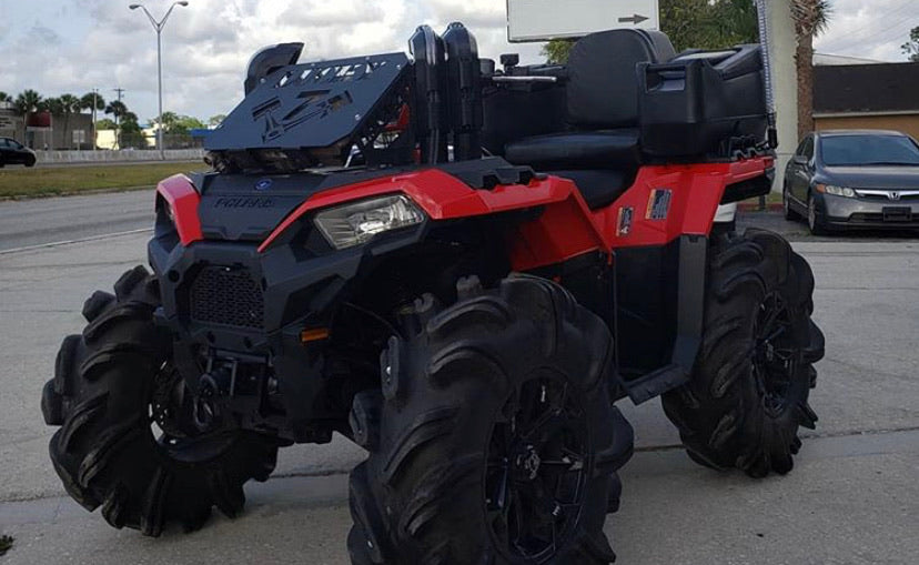 Lucky 7 design radiator relocate kit on a Polaris Sportsman 850