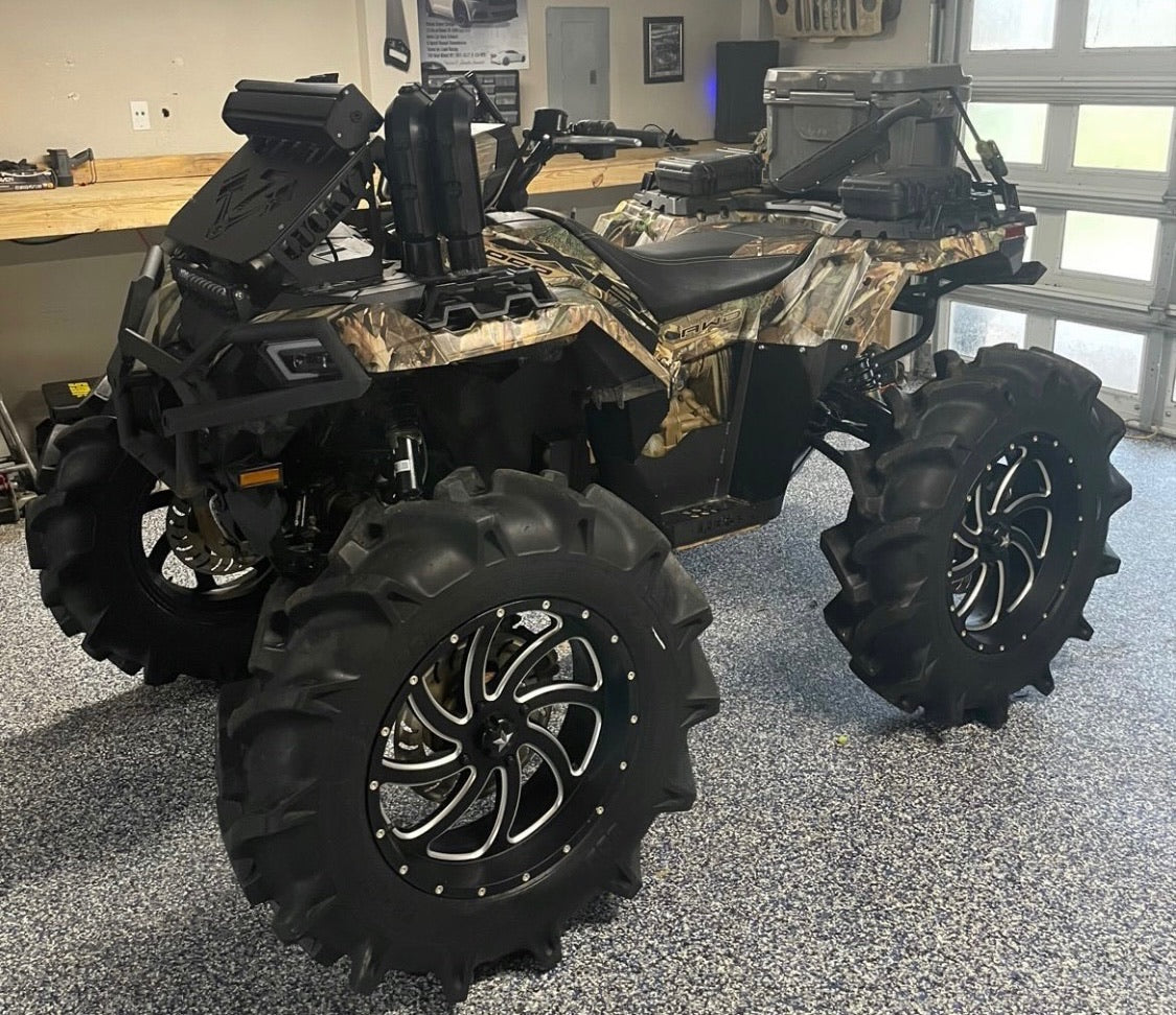 Lucky 7 metal floorboards installed on a camo Polaris Sportsman 850 SP 1000 XP