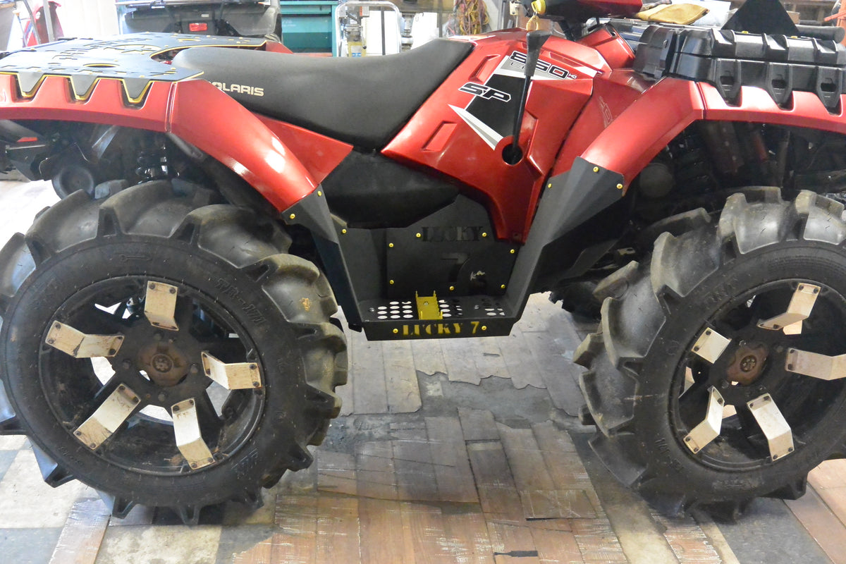 Red Polaris Sportsman 850 with Lucky 7 metal floorboards