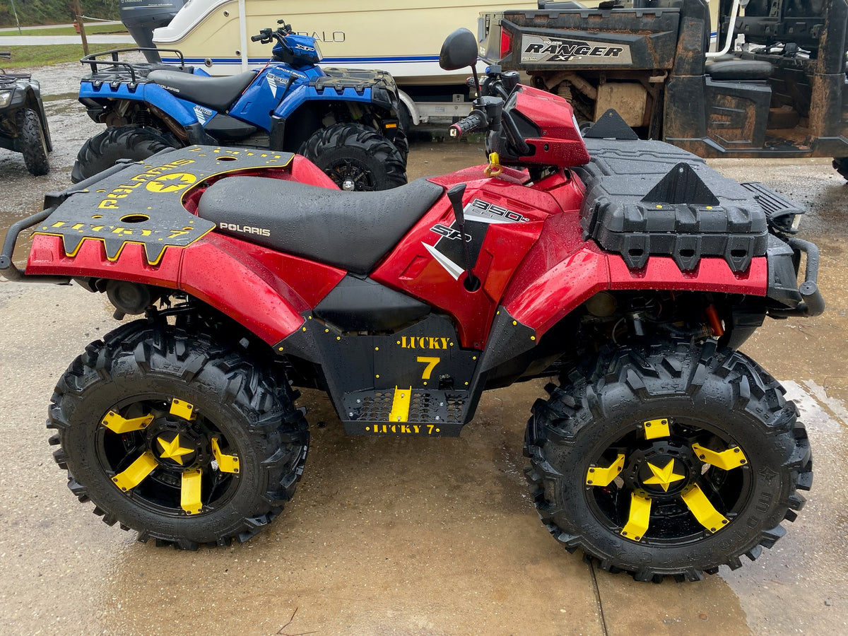 Side view of a Sportsman 850 SP with Lucky 7 metal floorboards