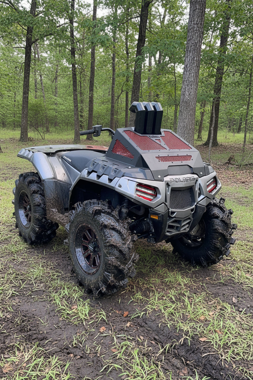 Black Lucky 7 3 inch snorkel riser kit on a Polaris Sportsman High Lifter with red radiator cover