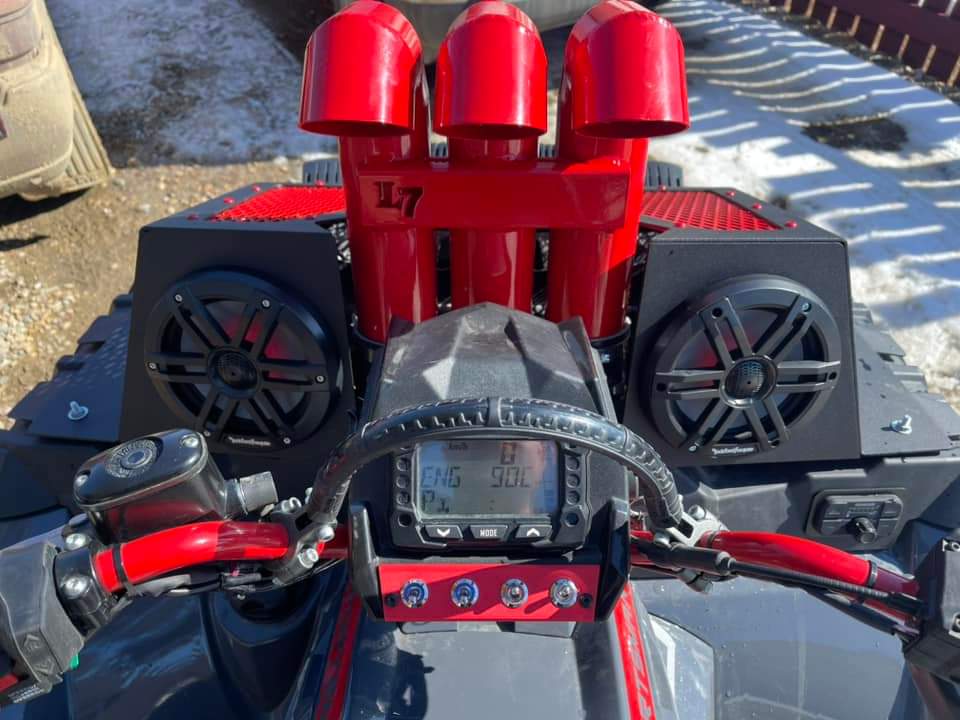 Indy Red Lucky 7 3 inch aluminum snorkel riser kit on a Polaris Sportsman High Lifter