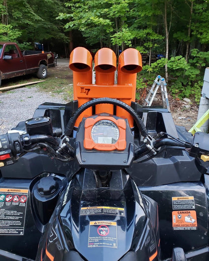 Orange Lucky 7 3 inch aluminum snorkel riser kit on a Polaris Sportsman High Lifter