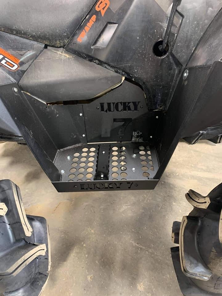 Lucky 7 logo on Sportsman High Lifter metal floorboards