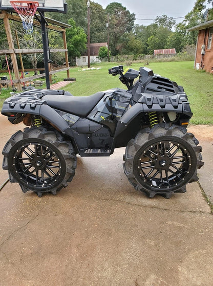 Black Polaris Sportsman High Lifter with Lucky 7 metal floorboards