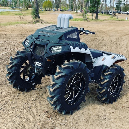 Gray Lucky 7 radiator cover and snorkel risers on a Polaris Sportsman High Lifter 