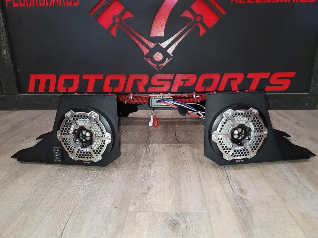 Pair of DS18 speakers in Lucky 7 Polaris Sportsman High Lifter radiator cover plates