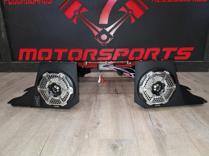 Pair of DS18 speakers in Lucky 7 Polaris Sportsman High Lifter radiator cover plates