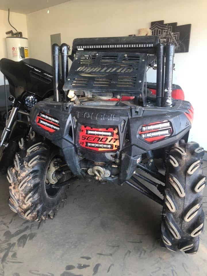 Polaris Sportsman with Indy Red Send It double LED grille installed by Lucky 7 Motorsports