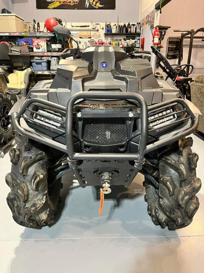 Polaris Sportsman with Lucky 7 dual slim row LED lights installed behind a front bumper