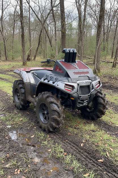 Polaris Sportsman High Lifter on the trail with Lucky 7 slim row LED lights and red radiator cover
