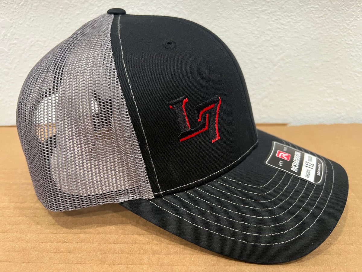 Side view of Richardson 112 Lucky 7 trucker hat in black and grey