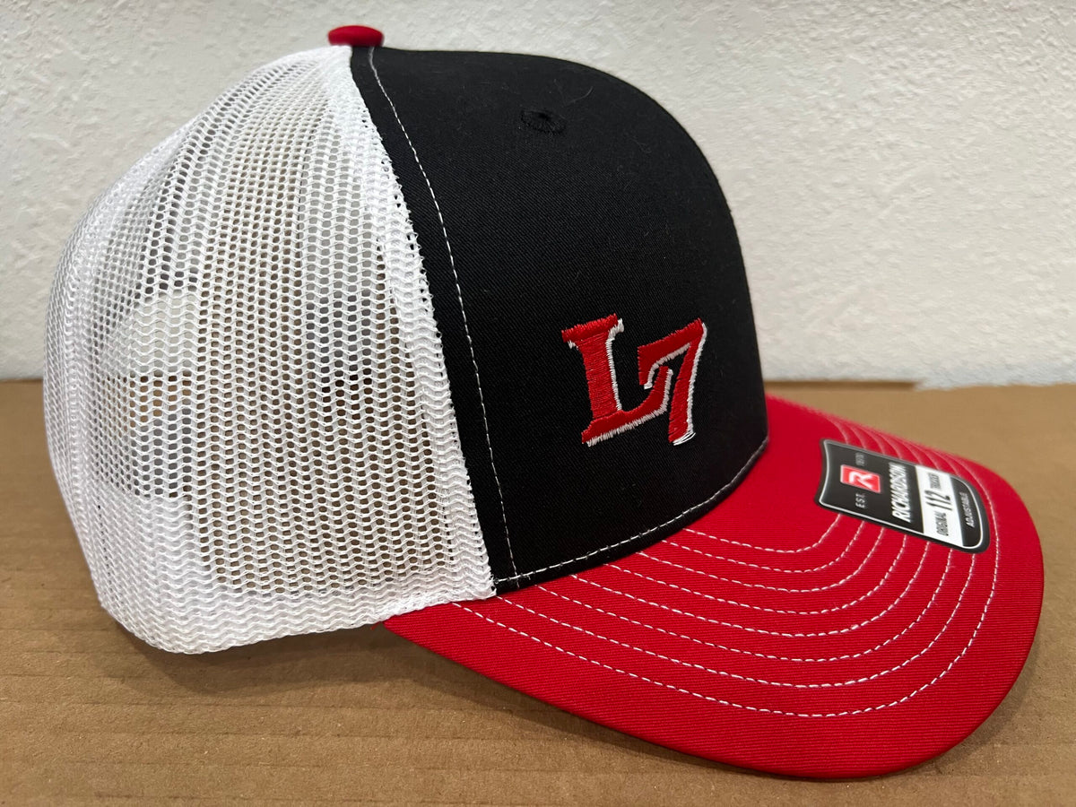 Side view of Richardson 112 Lucky 7 trucker hat in red, black, and white