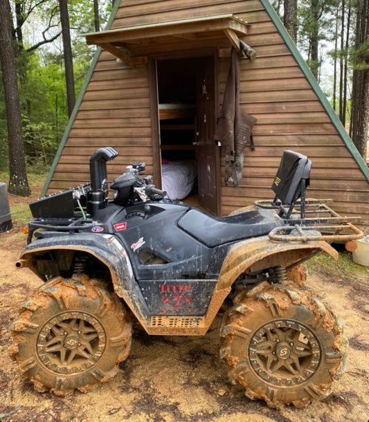 Muddy Yamaha Grizzly with Lucky 7 high-clearance metal floorboards